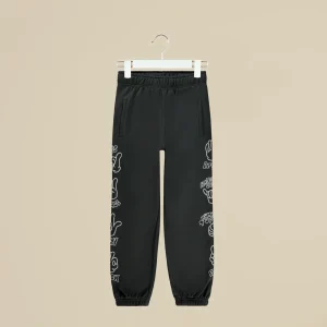 Pantalone in tuta grigia con simboli sui fianchi