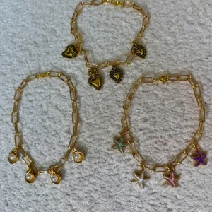 Cavigliere Gold Charms