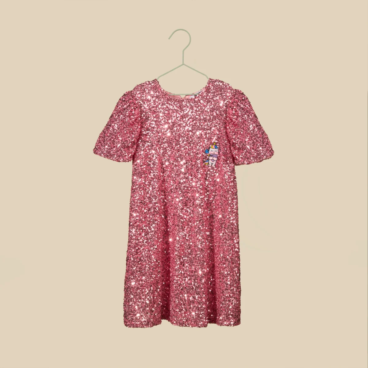 Vestito paillettes rosa con maniche a sbuffo